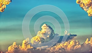 Swirling evening clouds illuminated by the setting sun