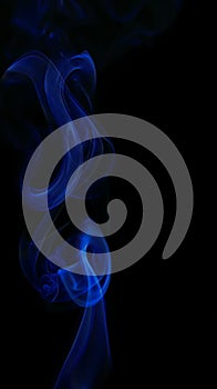 Swirling movement of blue smoke group