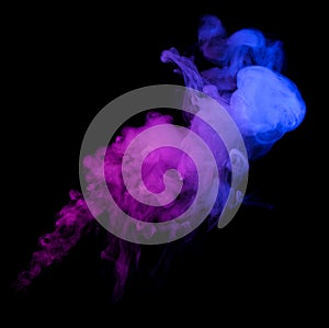 Swirling neon colored smoke puff cloud design element isolated on black