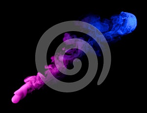 Swirling neon colored smoke puff cloud isolated on black