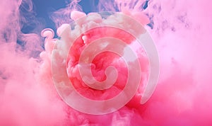 Swirling pink pastel clouds with blue background. Acrylic colors and ink in water. Abstract background, Cloud of silky