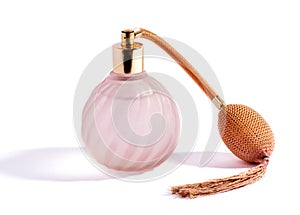 Swirling pink perfume bottle and atomizer