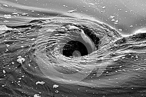 Swirling pool of water photo