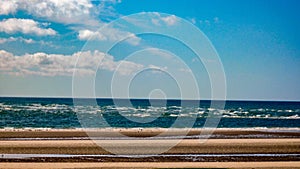 Swirling Surf Off A Beach In Puerto Penasco