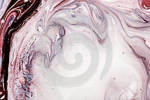 Swirls of marble or the ripples of agate. Liquid marble texture with pink and brown colors. Abstract painting background