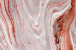 Swirls of marble or the ripples of agate. Liquid marble texture with pink and brown colors. Abstract painting background