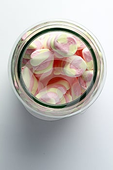 Swirly marshmallow candy in a glass jar