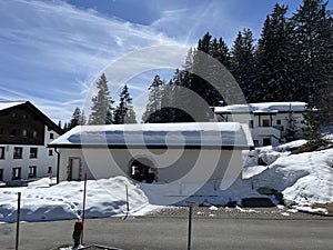 Swiss alpine holiday homes, mountain villas and holiday apartments in the winter ambience of the Alpine tourist resorts