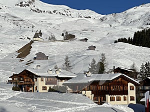 Swiss alpine holiday homes, mountain villas and holiday apartments in the winter ambience of the winter resort of Arosa