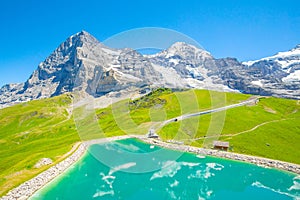 Swiss Alps and beautiful Fallboden lake near Kleine Scheidegg village, Jungfrau region, Switzerland