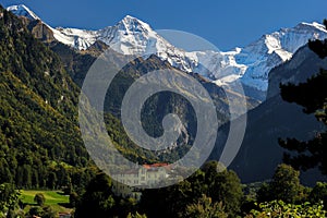 Swiss alps cliff, mountains and valley.