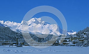 Swiss alps: Frozen Lake St. Moritz, viewing Piz Maloja in the Upper Engadin