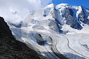 Swiss alps: Piz PalÃÂ¼ peak and melting glaciers due to global cl photo