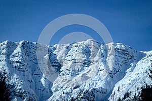 Swiss Alps: Snowmountain. White snow and blue sky. Winter Landscapes.