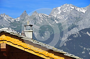 Swiss chalet roof with alps