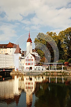 Swiss characteristic buildings and Reuss river in Bremgarten near Zurich