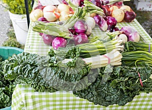 Swiss Chard and other vegetables on a table for sale