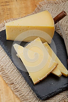 Swiss cheese collection, gruyere cheese made from unpasteurized cow\'s milk