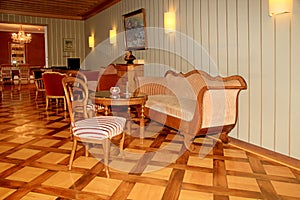 Swiss country hotel lobby interior with classic furniture and de