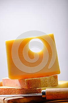 Swiss Emmental or Emmentaler medium-hard cheese with round holes made from cow milk in Canton Bern