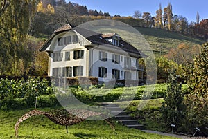 Swiss farm and house in the middle of nature near Gurten hill from Wabern