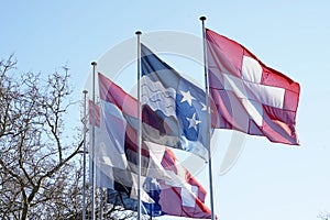 Swiss federal flag, cantonal flag of canton Aargau and municipal one of town Baden. photo