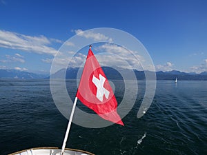 Swiss Flag Symbol On Lake Geneva, Switzerland