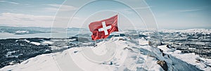 Swiss flag waves over stunning alpine mountains, symbolizing national pride and natures magnificence