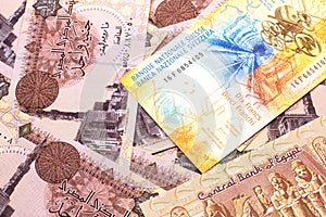 A Swiss franc bank note with Egyptian one pound bank notes