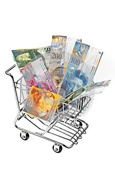 Swiss Franc Money with shopping basket photo