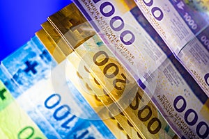 Swiss Francs Banknotes on a Glassy Desk