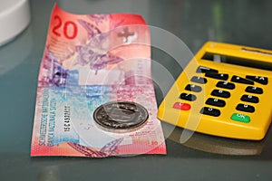 Swiss francs money and calculator