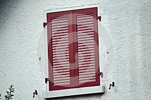 Swiss house with red windows