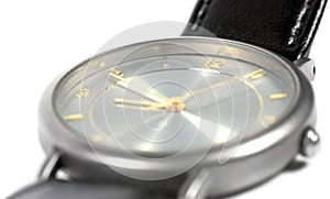 Swiss made watch face titanium case flat sapphire glass gold grey classic style luxury men's wristwatch detailed macro closeu