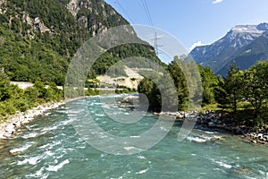 Swiss river named Reuss on a beautiful sunny day. Gorgeous landscape