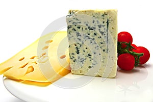 Swiss and roquefort cheeses and cherry tomato