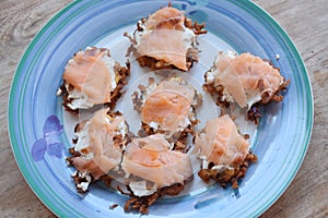 Swiss rÃÂ¶sti with cheese and salmon photo