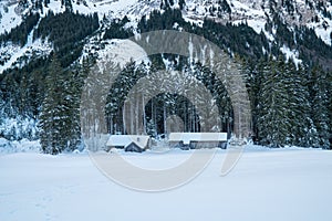 Swiss Winter - Barn under mountain