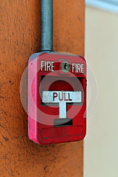 Switch fire alarm on brick wall