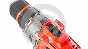 Switch in a modern screwdriver on a drill, close-up. White background, isolate, industry