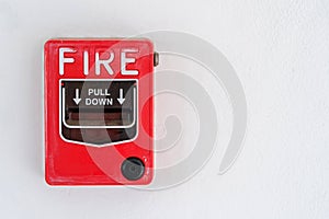 Switch to Fire alarm system on white wall background