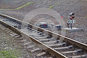 Switch with traffic lights on the railway .