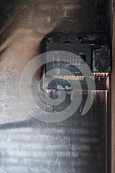 switchboard electricity burn on brick wall texture background