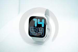 Switched-on smart watch on a white background