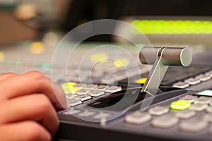 Switcher buttons in studio TV station, Audio and Video Production Switcher of Television Broadcast.