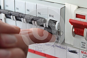 Switching an MCB & x28;Micro Circuit Breaker& x29; on a UK domestic electr photo