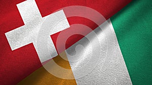 Switzerland and Cote d `Ivoire Ivory coast two flags textile fabric texture