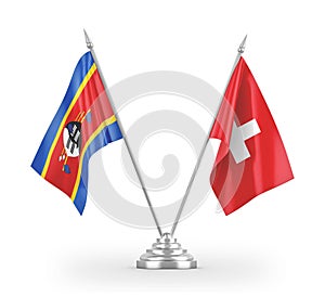 Switzerland and Eswatini Swaziland two table flags isolated on white photo