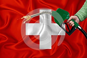 SWITZERLAND flag Close-up shot on waving background texture with Fuel pump nozzle in hand. The concept of design solutions. 3d
