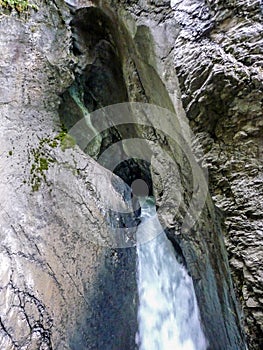 Switzerland, Lauterbrunnen, CLOSE-UP OF WATER FLOWING THROUGH ROCKS
